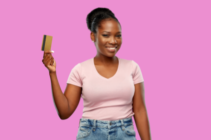 beautiful ethnic woman smiling holding credit card