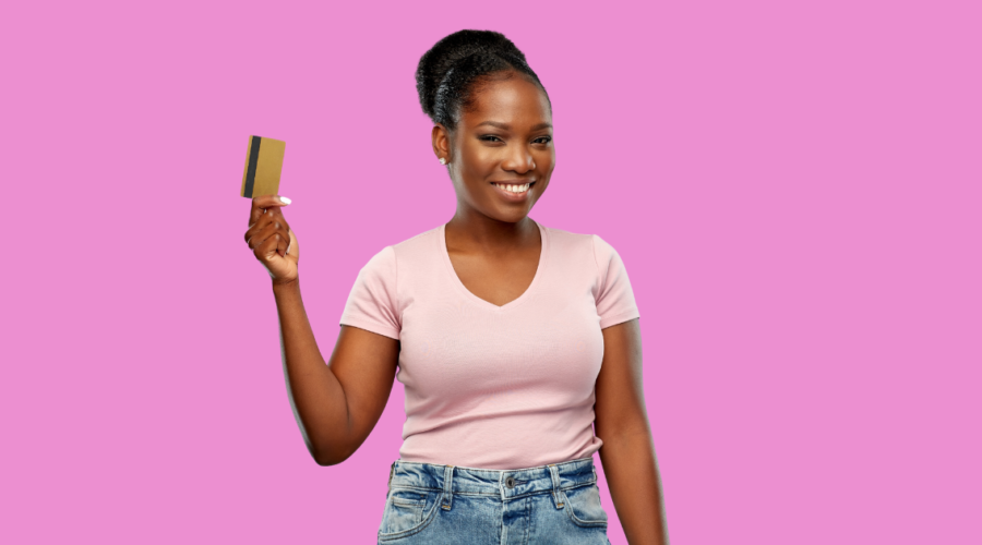 beautiful ethnic woman smiling holding credit card