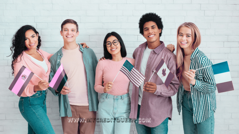 Group of young adult immigrants holding flags from different countries