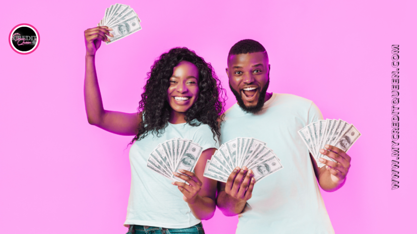 happy black couple smiling and holding hundred dollar bills,